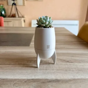Petit pot de fleur en forme de fusée Astro imprimé en 3D couleur gris clair mat par 3DWorlds.